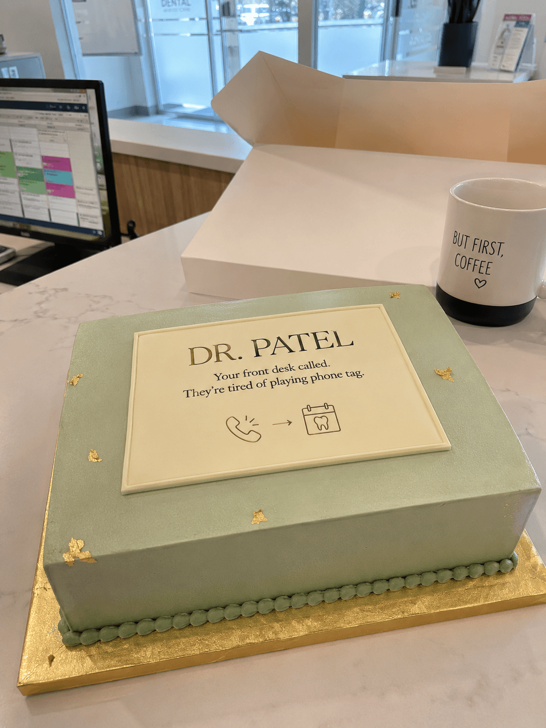 Personalized cake delivered to Dr. Patel's dental practice